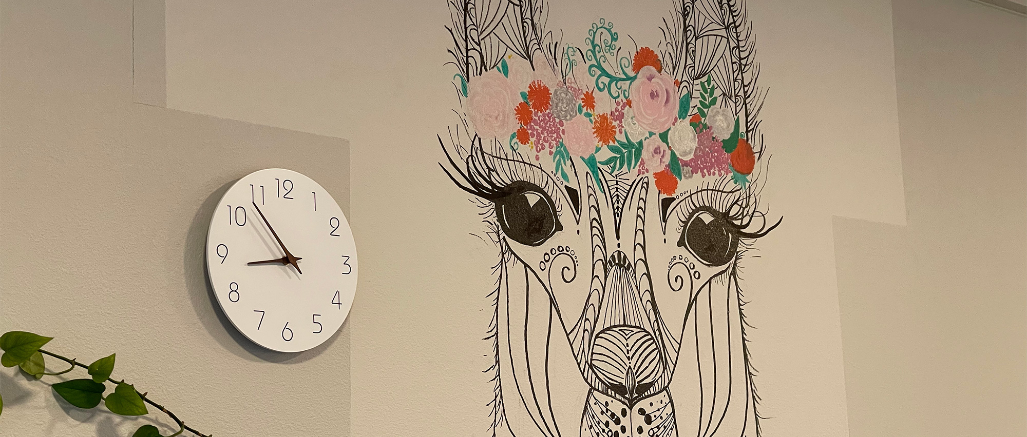 Interior of the Lash Club studio - wall painting of a llama